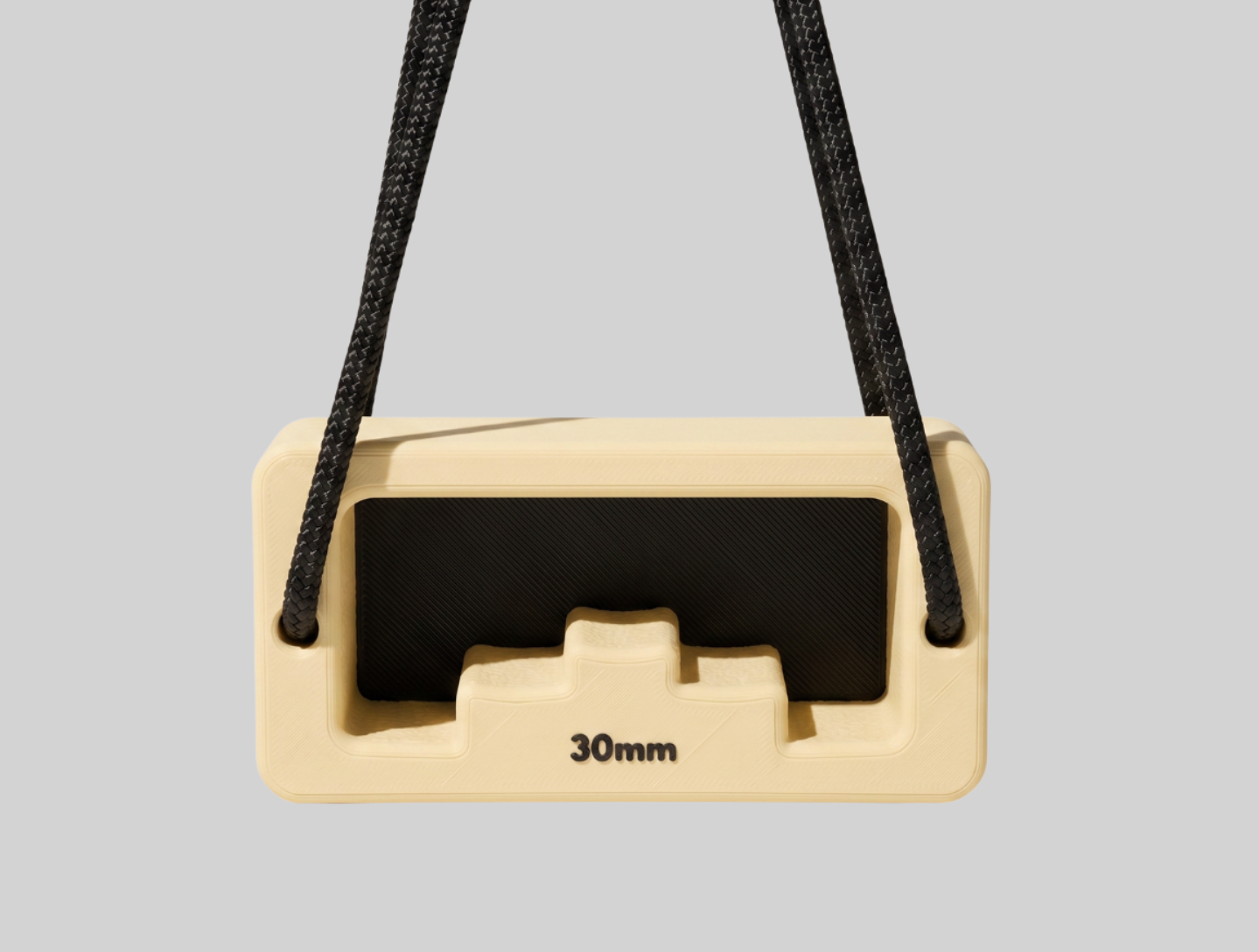 Cream and black DAB BLOCK 02 hanging from black cord
